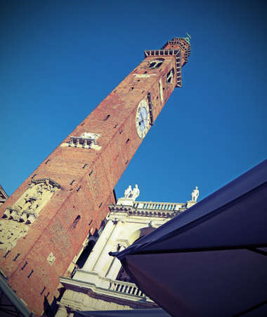 tower of an ancient palace called Torre Bissara in Vicenza City in Northen Italy with vintage effectの写真素材