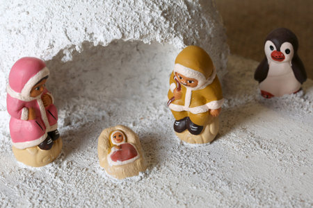 Igloo and Icelandic crib figurines of the Holy Family set at the North Poleの写真素材