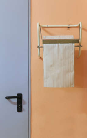 Large industrial roll of absorbent paper to wipe hands and surfaces wetの写真素材