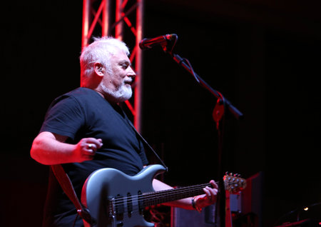 Bassano del Grappa, VI, Italy - April 29, 2017: Falzone Cico guitar player of Nomadi an Italian Musical Group on stage during a live concertのeditorial素材