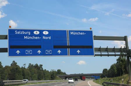 Driving directions on the highway to go to the city of Innsbruck in Austriaの写真素材