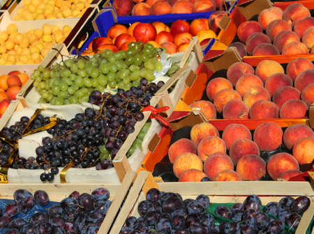 many fruit boxes for sale in the fruit and vegetable marketの写真素材