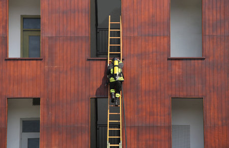 firefighter exercise while climbing in the fire station building