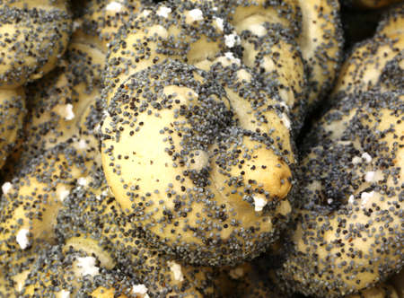 baked bread pieces made with whole wheat flour and poppy seedsの写真素材