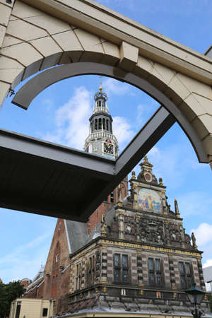 Drawing bridge and old church in the city of Alkmaar in Hollandの写真素材