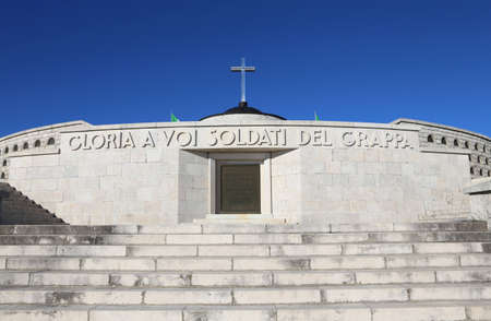Vicenza, VI, Italy - December 8, 2015: War Memorial of First War World called Ossario Monte Grappa with tombs of italian fallen soldiers. Big Text means Glory at Fallen Soldiers in Grappa Mountainのeditorial素材