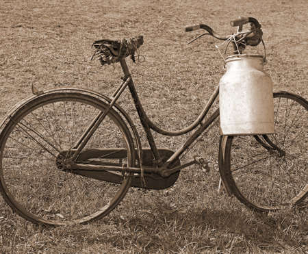 ancient milking bike with aluminum bin for milk transport and speia effectの写真素材