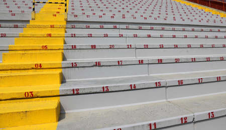 numbers on the stadium bleachers to indicate a seat at sporting eventsの写真素材