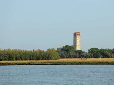 bell tower of the Cathedral of Santa Maria Assunta in the Torcello Island near Venice in Italyの写真素材