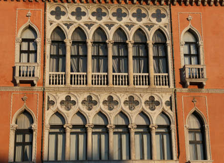 facade of an ancient palace in Venice Italyの写真素材