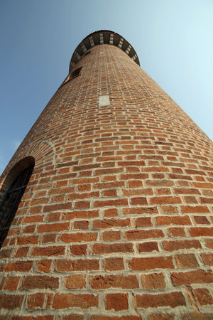 high tower of the city aqueduct in the island of Burano near Venice in Italyの写真素材