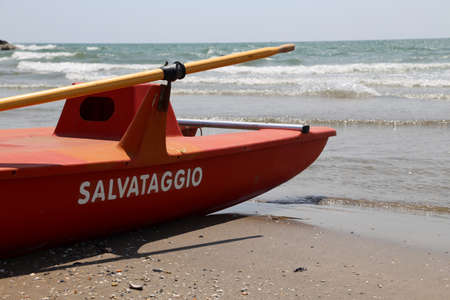 lifeguard rescue boat at the seaside with the great SALVATAGGIO meaning salvage in italianの写真素材