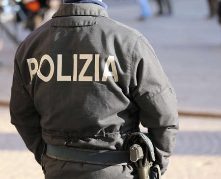 policeman during an anti-terrorist patrol on the streets of the city to avoid the attacksの写真素材