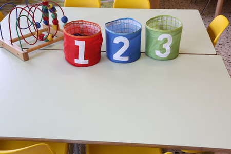 colorful jar with text one two three on the table in the primary schoolの写真素材