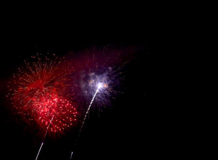 magnificent artificial fireworks at night with black skyの写真素材