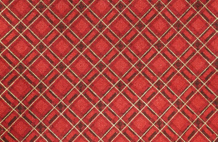 red fabric with colorful Tartan-type Scottish designsの写真素材