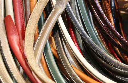 many leather handles for the creation of handmade leather handbagsの写真素材