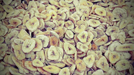background of many dried bananas at marketの写真素材