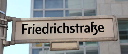 indication of the main street of Berlin in the road sign called friedrichstrasse that means Frederick Avenueの写真素材