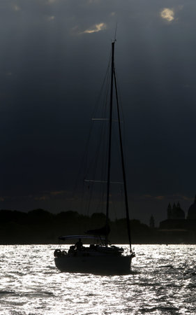 boat on the sea with backlit photographic effectの写真素材