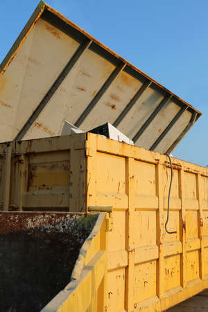 containers with many washing machines and obsolete household appliances at the collection center for recyclable materialsの写真素材