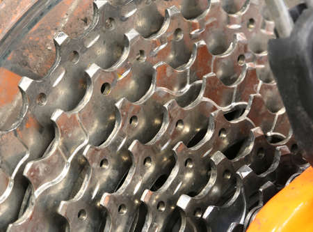 detail of a metal chain rings of a bikeの写真素材