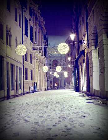 Palace and street in downtown called CONTRA DEL MONTE of Vicenza City in Italy with snow with vintage effectのeditorial素材