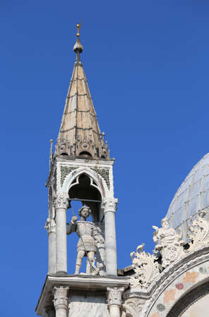detail of the statue over the Basilica of Saint Mark in Venice in Italyの写真素材
