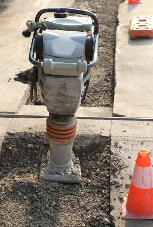 compactor for road works with a petrol engine called BIG FROG by the workers