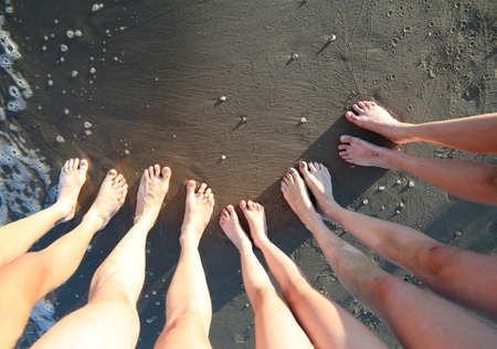 barefoot of the happy family of five people with father mother and three children in summerの写真素材