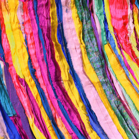colored background of many fabrics of cotton and syntheticの写真素材