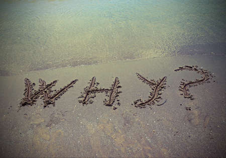 why written on the sand of the beach in summerの写真素材