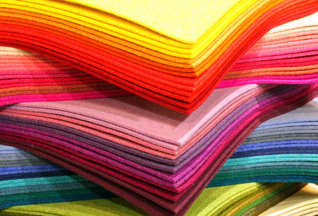many pieces of colored felt on sale in the haberdashery shop. Felt panels can be used to create many...