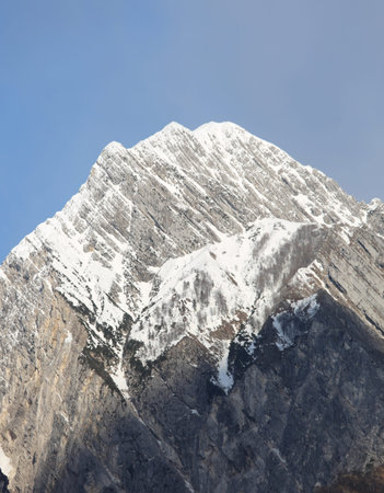 panoramic View of an High mountain called Amariana in the Alps with snow in Norhtern Italy