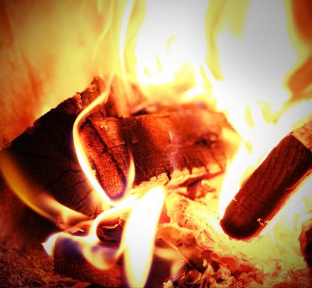 pieces of wood and many flame of fireの写真素材