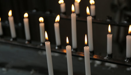 candles made with wax with flames during religion mass in the church