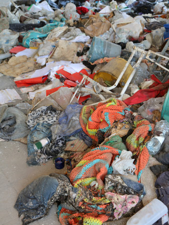 many tatters and rags in the dirty homeless shelter
