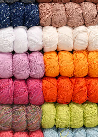 Many soft wool balls for sale in the shop knitwear itemsの写真素材