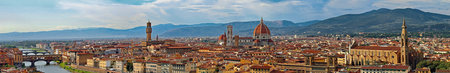 Florence Italy wide panorama joining many photographs to have an incredible wide-angle effect with Old Bridge and the Dome of Cathedral in the same frameの写真素材