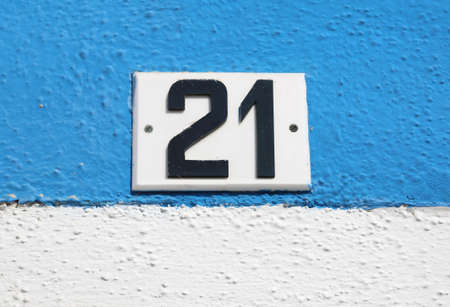 big text number 21 on the wallの写真素材