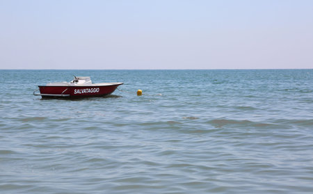 Boat with text SALVATAGGIO that means RESCUE in Italian