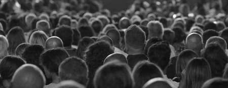 many audience people during the live outdoor concert with black and white effectの写真素材