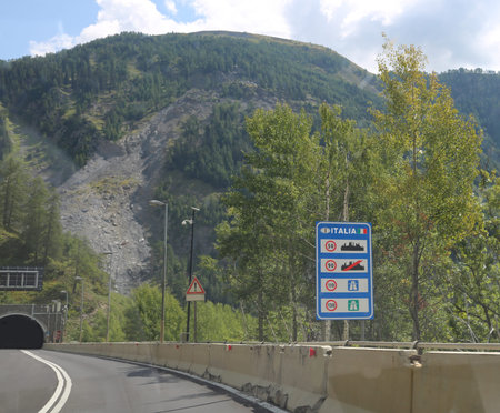 Italian border with the road sign with the obligations and bans on the Italian roadsの写真素材