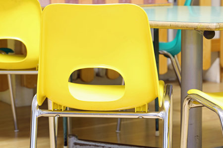 yellow chair in the classroom of the primary school