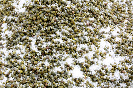 many green capers under salt for sale in the mediterranean storeの写真素材