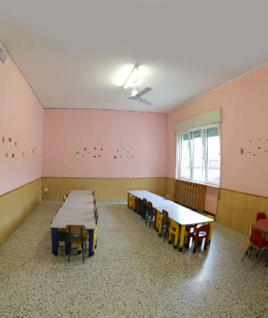 little chairs and tables of a refectory of the kindergarten without the kidsの写真素材