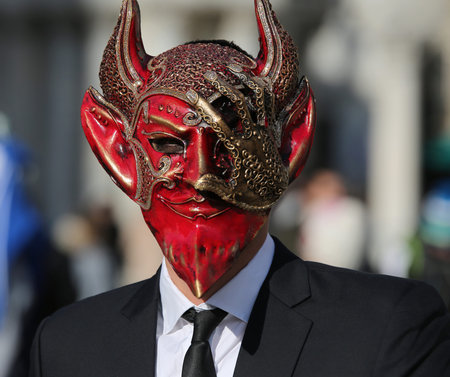 Venice, VE, Italy - February 5, 2018: Devil Mask at the Venice Carnival in Saint Mark Square