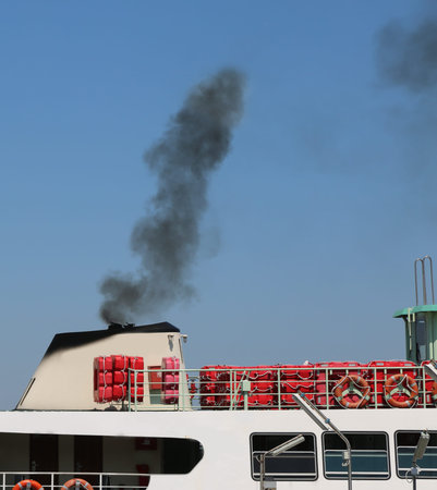 polluted black smog of the boat to transport passengers