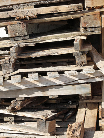 abandoned wooden boards of the old pallets used to transport the goods