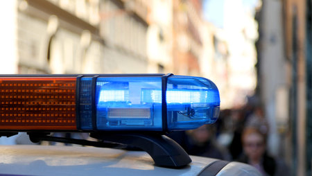 big siren of a police patrol car at a roadblock for city security